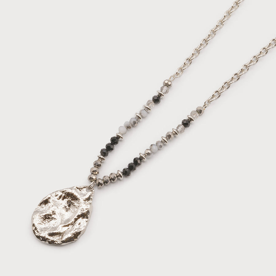 Long pendant with hammered metal piece on chain with glass beads 1709-BLK-S
